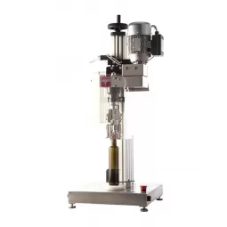 Pusiau automatinis valcavimo aparatas užsukamiems dangteliams